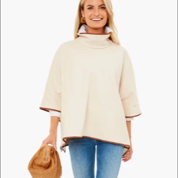 Ivory Pearl Leather Trim Funnel Neck Piper Poncho
TUCKERNUCK - Picture 5 of 8